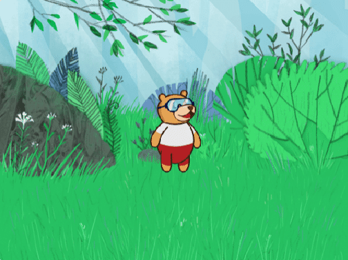 Tobi the bear character standing in a forest backdrop inside PictoBlox
