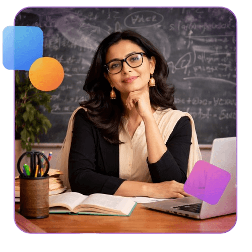 Image of a teacher sitting in a classroom